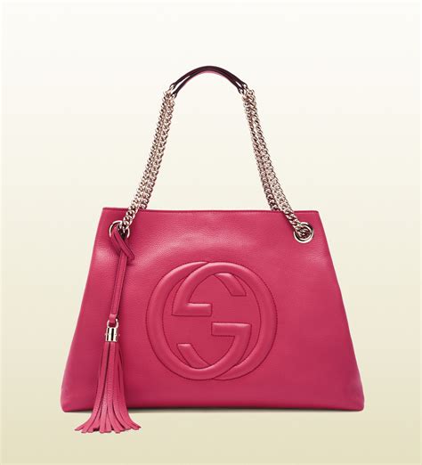 Soho small shoulder bag in pink and red leather 